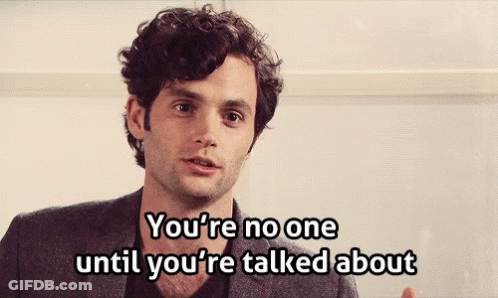 A Man Says " You 'Re No One Until You 'Re Talked About " In Front Of A White Wall GIF