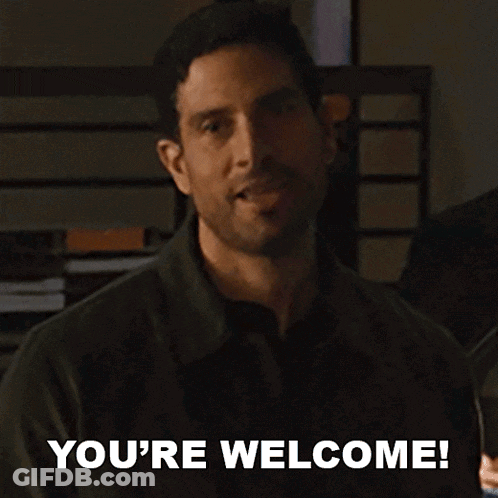 A Man Says " You 'Re Welcome " While Smiling And Looking At The Camera GIF
