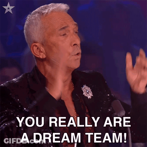 A Man Says You Really Are A Dream Team In Front Of A Microphone GIF