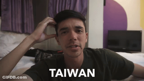 A Man Scratching His Head With The Word Taiwan On The Bottom Right GIF