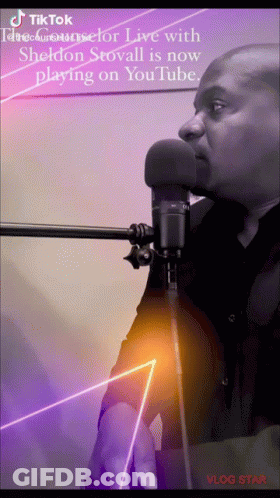 A Man Singing Into A Microphone With A Tiktok Logo On The Bottom Right GIF