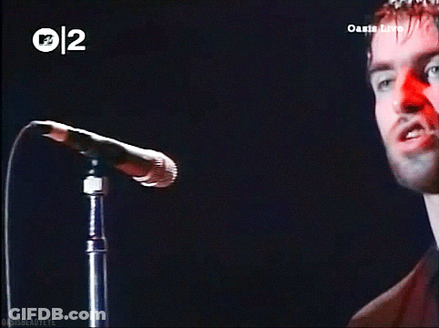 Man Singing Into Microphone Oasis Live GIF