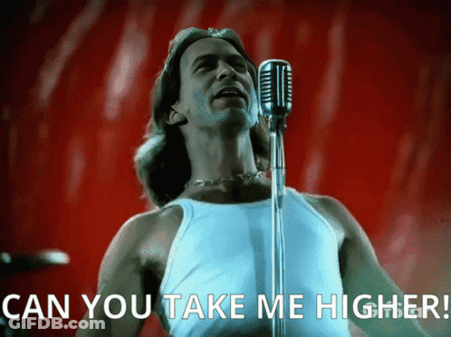 A Man Singing Into A Microphone With The Words " Can You Take Me Higher " Below Him GIF