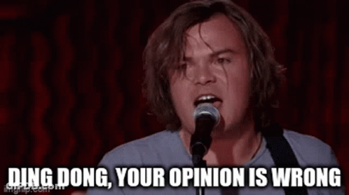 A Man Singing Into A Microphone With The Words Ding Dong Your Opinion Is Wrong GIF