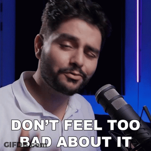 A Man Singing Into A Microphone With The Words Do N't Feel Too Bad About It GIF