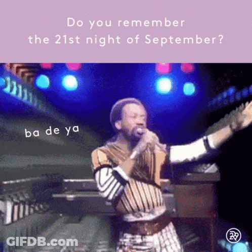 A Man Singing Into A Microphone With The Words " Do You Remember The 21St Night Of September " GIF