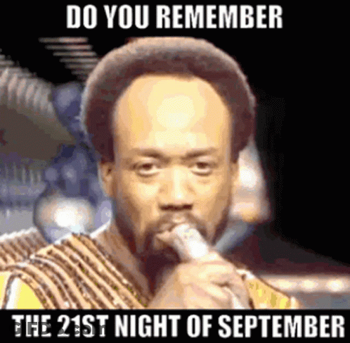 A Man Singing Into A Microphone With The Words " Do You Remember The 21St Night Of September " Below Him GIF