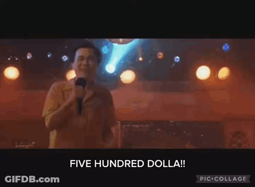 A Man Singing Into A Microphone With The Words Five Hundred Dolla On The Bottom Right GIF