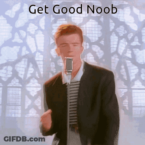 A Man Singing Into A Microphone With The Words " Get Good Noob " Above Him GIF