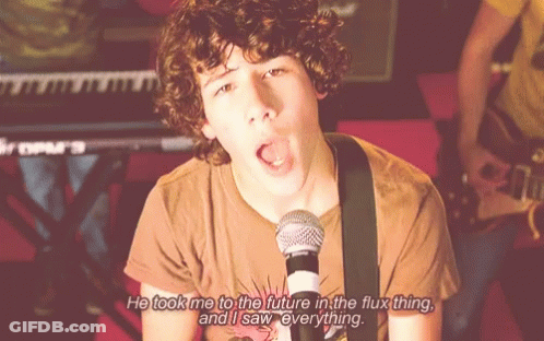 A Man Singing Into A Microphone With The Words He Took Me To The Future In The Flux Thing And I Saw Everything GIF