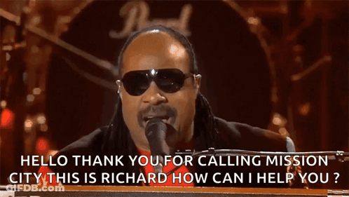 A Man Singing Into A Microphone With The Words Hello Thank You For Calling Mission City On The Bottom GIF