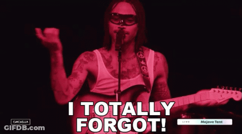 A Man Singing Into A Microphone With The Words " I Totally Forgot " Above Him GIF
