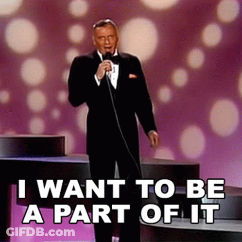 A Man Singing Into A Microphone With The Words " I Want To Be A Part Of It " Above Him GIF