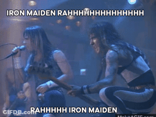 A Man Singing Into A Microphone With The Words Iron Maiden Written On The Bottom GIF