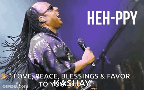 A Man Singing Into A Microphone With The Words " Love Peace Blessings & Favor To Yka Shay " GIF