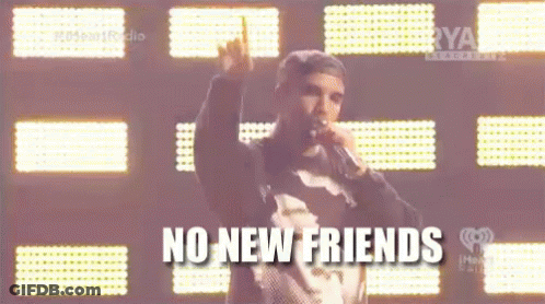A Man Singing Into A Microphone With The Words " No New Friends " On The Bottom GIF