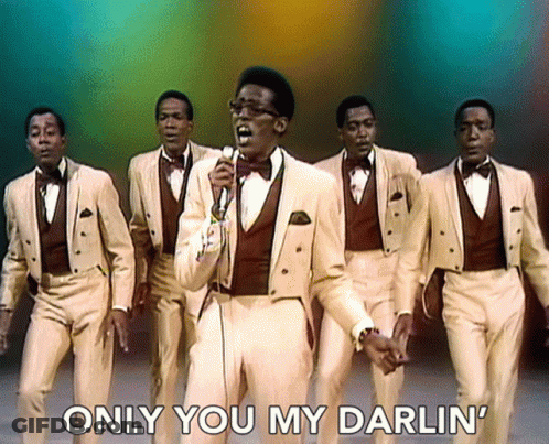 A Man Singing Into A Microphone With The Words " Only You My Darlin " Below Him GIF