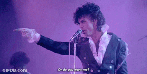 A Man Singing Into A Microphone With The Words " Or Do You Want Me " Above Him GIF