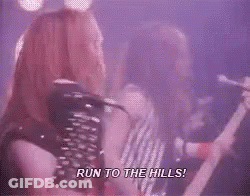 A Man Singing Into A Microphone With The Words Run To The Hills Written Below Him GIF