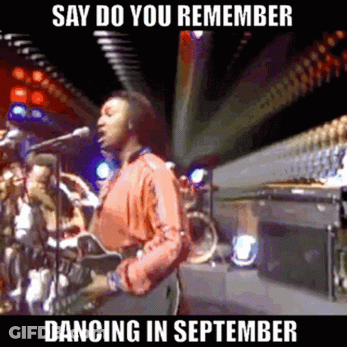 A Man Singing Into A Microphone With The Words Say Do You Remember Dancing In September On The Bottom GIF