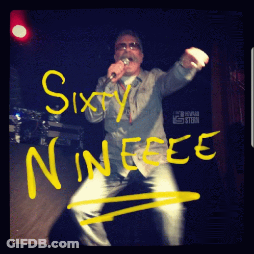 A Man Singing Into A Microphone With The Words Sixty Nineee Written On The Wall GIF