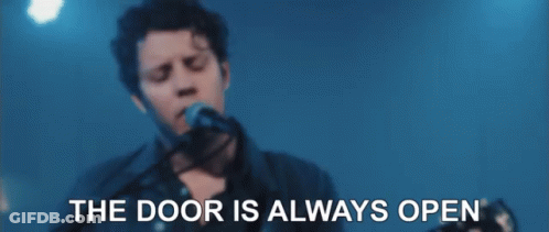 Man Singing Into Microphone The Door Is Always Open GIF