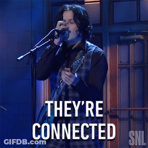 A Man Singing Into A Microphone With The Words They 'Re Connected GIF