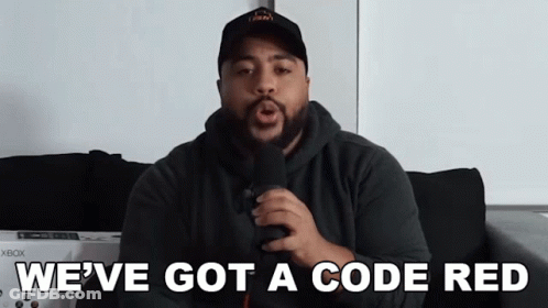 A Man Singing Into A Microphone With The Words We 'Ve Got A Code Red Above Him GIF