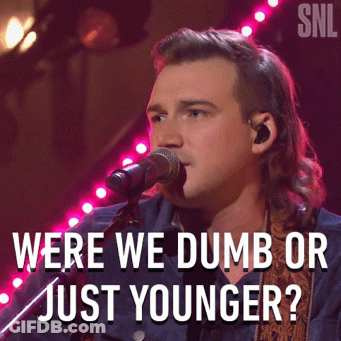 A Man Singing Into A Microphone With The Words Were We Dumb Or Just Younger On The Bottom GIF