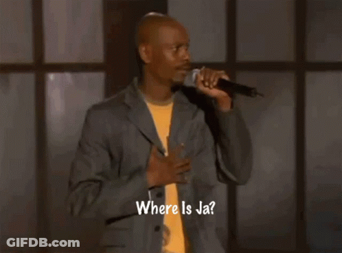 A Man Singing Into A Microphone With The Words Where Is Ja Written On The Bottom GIF