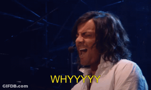 A Man Singing Into A Microphone With The Words " Whyyyy " Below Him GIF