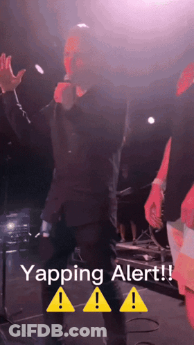 A Man Singing Into A Microphone With The Words Yapping Alert GIF