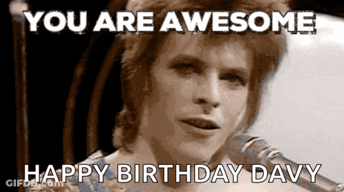 A Man Singing Into A Microphone With The Words " You Are Awesome Happy Birthday Davy " Below Him GIF