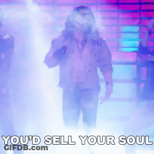 A Man Singing Into A Microphone With The Words " You 'D Sell Your Soul " Behind Him GIF
