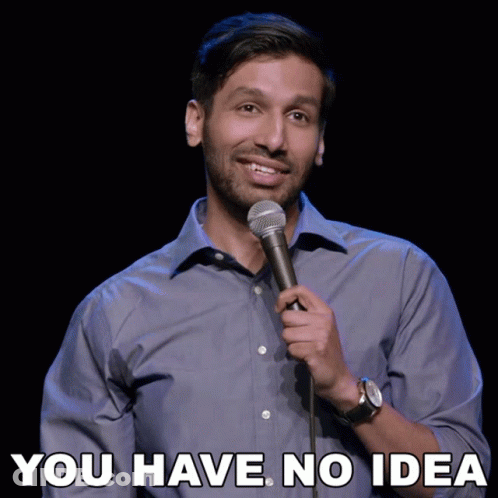 A Man Singing Into A Microphone With The Words " You Have No Idea " Above Him GIF