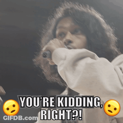 A Man Singing Into A Microphone With The Words You 'Re Kidding Right GIF