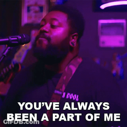 A Man Singing Into A Microphone With The Words " You 'Ve Always Been A Part Of Me " GIF