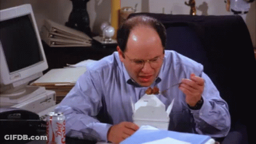 A Man Sits At A Desk With A Can Of Diet Coke Next To Him GIF