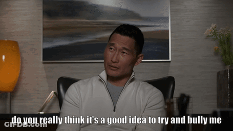 A Man Sits In A Chair With The Words Do You Really Think It 'S A Good Idea To Try And Bully Me GIF
