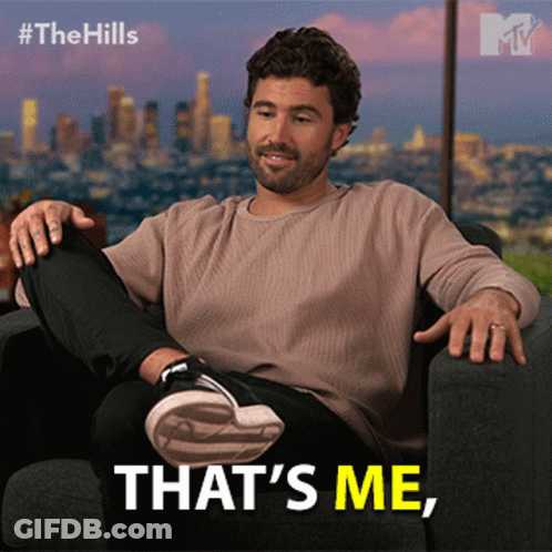 A Man Sits In A Chair With The Words That 'S Me GIF