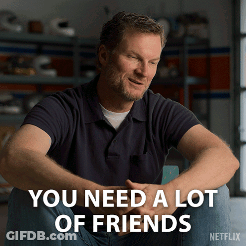 A Man Sits In A Chair With The Words " You Need A Lot Of Friends " Above Him GIF