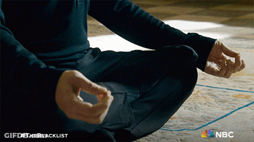 A Man Sits In A Lotus Position With #Theblacklist On The Bottom GIF