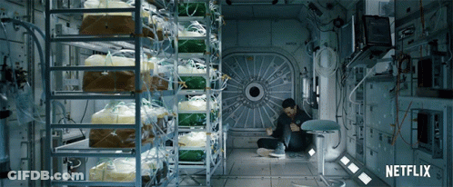A Man Sits In A Room With Netflix Written On The Bottom Right GIF