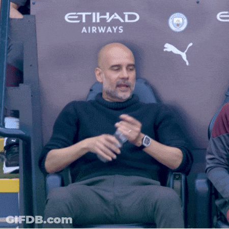 A Man Sits In An Etihad Airways Seat Holding A Bottle Of Water GIF
