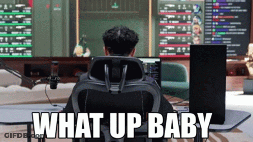 A Man Sits In Front Of A Computer Screen With The Words What Up Baby Written On The Bottom GIF