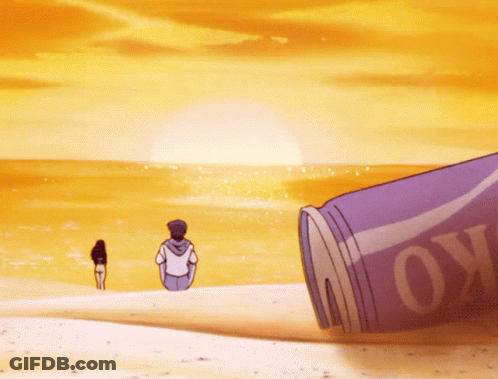 A Man Sits On A Beach Next To A Can That Says " Move " GIF