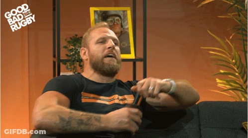 A Man Sits On A Couch With The Words Good Bad And Rugby Written On The Bottom GIF