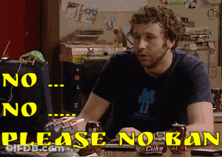 A Man Sitting At A Desk With A Can Of Coke On The Table GIF