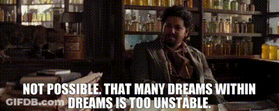 A Man Sitting At A Desk With A Quote That Says Not Possible That Many Dreams Within Dreams Is Too Unstable GIF