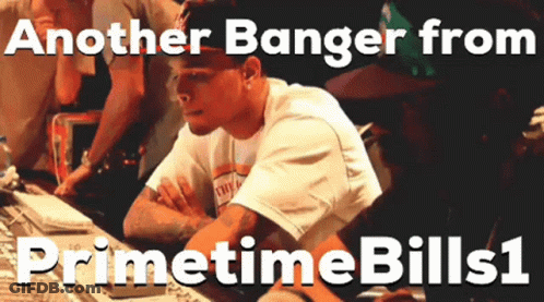 A Man Sitting At A Desk With The Words Another Banger From Primetime Bills GIF